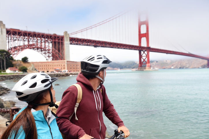 e-bike users sightseeing at golden gate bridge